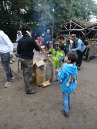 Max and his friends roasting marshmallows at the Afrikadorp village at the Safaripark Beekse Bergen