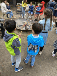 Max and his friend roasting marshmallows at the Afrikadorp village at the Safaripark Beekse Bergen