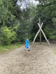 Max on a zip line at the playground of the Afrikadorp village at the Safaripark Beekse Bergen