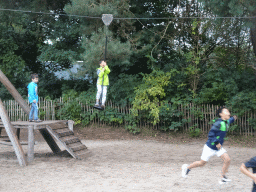Max and his friends at a zip line at the playground of the Afrikadorp village at the Safaripark Beekse Bergen