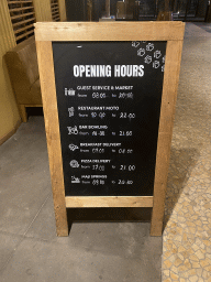 Sign with opening hours at Karibu Town at the Safari Resort at the Safaripark Beekse Bergen