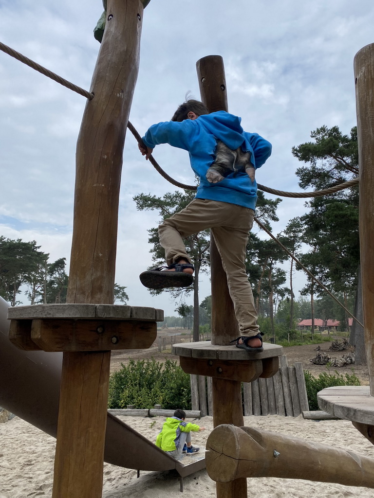 Max and his friend at the playground at Karibu Town at the Safari Resort at the Safaripark Beekse Bergen