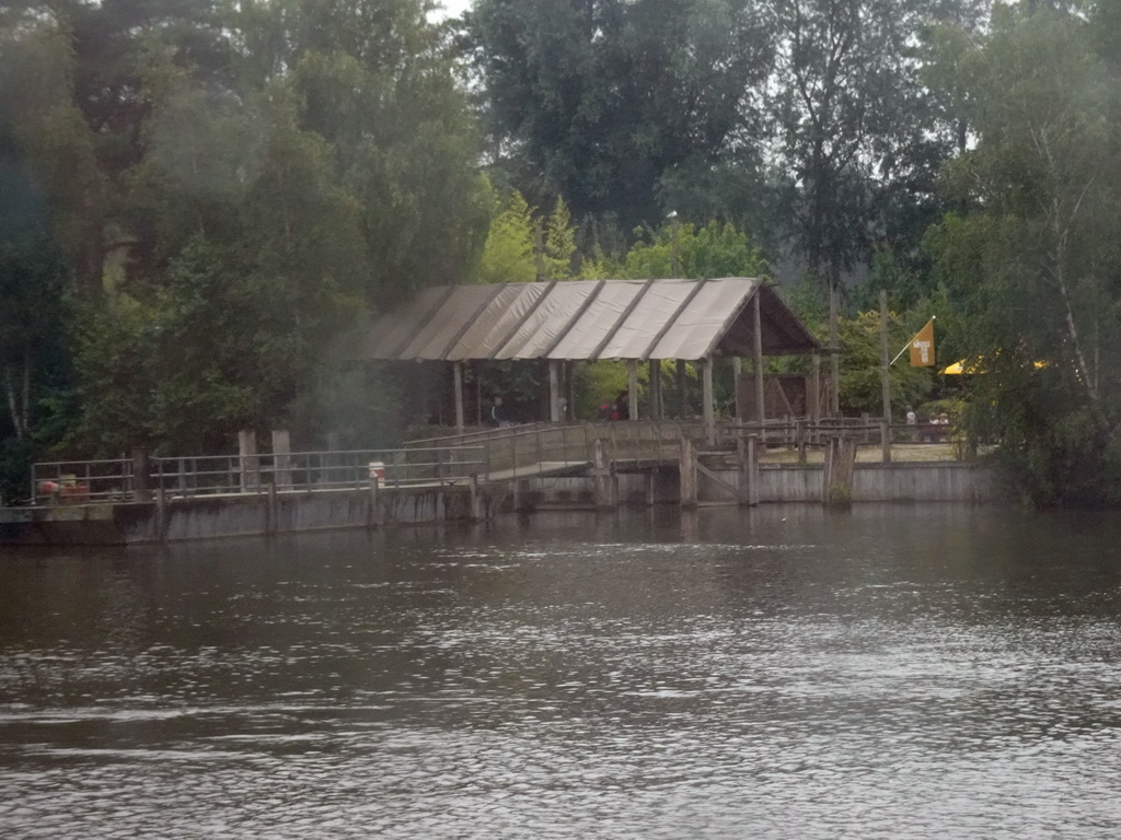 Safari boat terminal at the Kongoplein square at the Safaripark Beekse Bergen, viewed from the safari boat during the Boatsafari