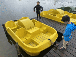 Max and his friend with a pedal boat at the Adventure Island at Speelland Beekse Bergen