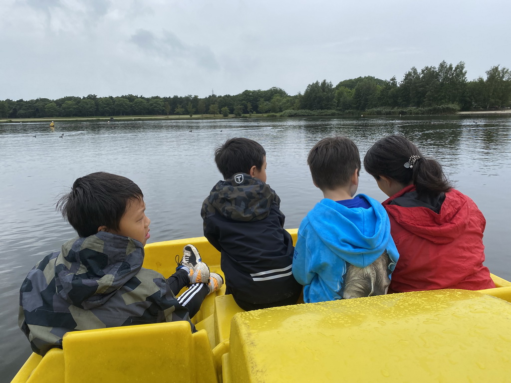Max and our friends on a pedal boat at Speelland Beekse Bergen