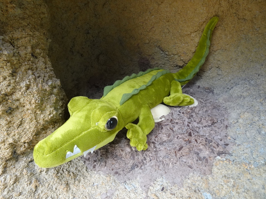 Max`s plush crocodile toy and a Crocodile egg statues at the Hippopotamus and Crocodile enclosure at the Safaripark Beekse Bergen