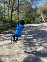 Max on a zip line at the playground of the Afrikadorp village at the Safaripark Beekse Bergen