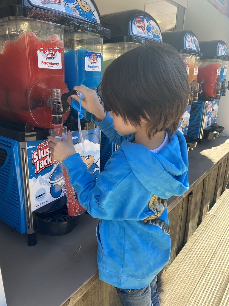 Max getting a slush puppie at the restaurant at the Afrikadorp village at the Safaripark Beekse Bergen