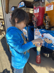 Max getting a slush puppie at the restaurant at the Afrikadorp village at the Safaripark Beekse Bergen