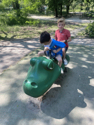 Max and his friend at the playground near the Classroom buildings at the Safaripark Beekse Bergen