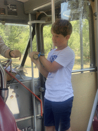 Max`s friend with a horn at the bus at the Safaripark Beekse Bergen, during the Bus Safari