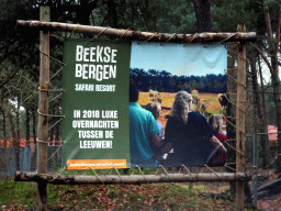 Poster on the Safari Resort at the Safaripark Beekse Bergen, under construction, viewed from the car during the Autosafari