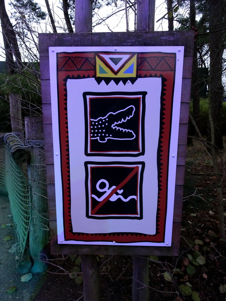 Sign in front of the Hippopotamus and Crocodile enclosure at the Safaripark Beekse Bergen, during the Winterdroom period