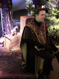 Story teller at the Verhalenverteller attraction at the Kongoplein square at the Safaripark Beekse Bergen, during the Winterdroom period, at sunset