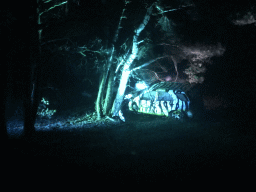 Safari Jeep parked against a tree at the Safaripark Beekse Bergen, viewed from the bus during the Winterdroom Night Bus Safari, by night