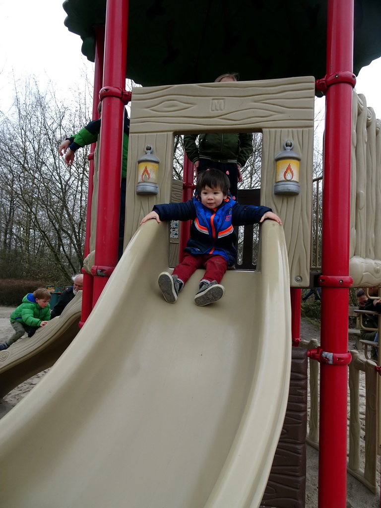 Max on the slide at the playground near the Hamadryas Baboons at the Safaripark Beekse Bergen