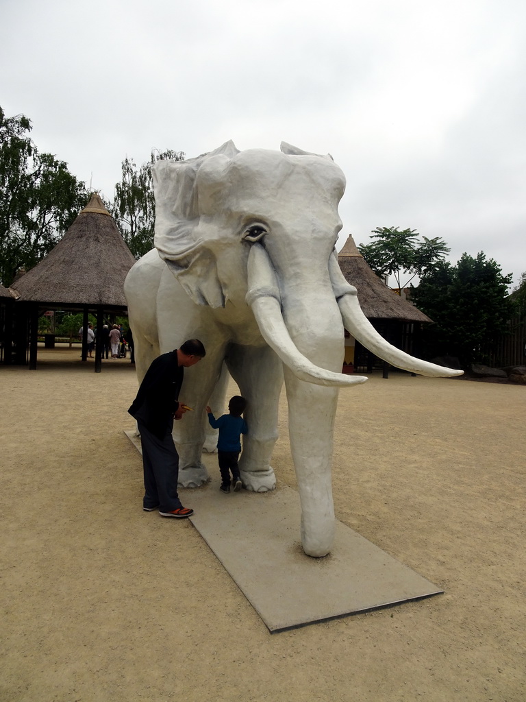 Max and his grandfather with an Elephant statue at the entrance to the Safaripark Beekse Bergen