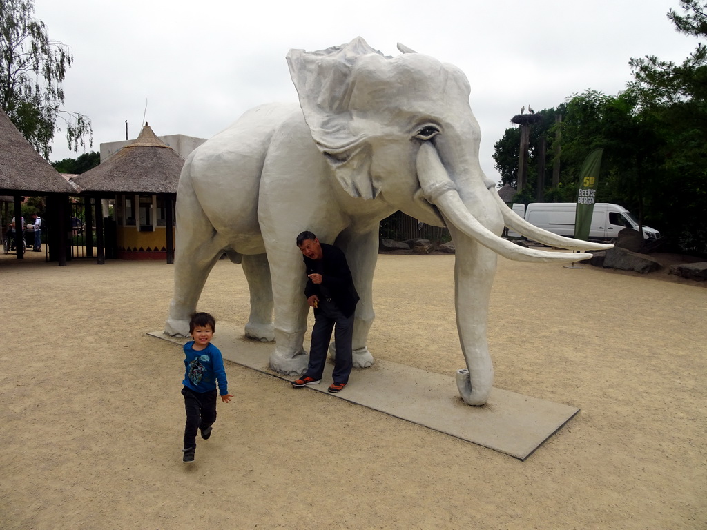 Max and his grandfather with an Elephant statue at the entrance to the Safaripark Beekse Bergen