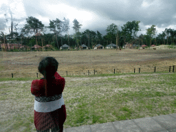 Miaomiao`s mother on the terrace of our holiday home at the Safari Resort at the Safaripark Beekse Bergen, with a view on the Masai Mara area with Rothschild`s Giraffes, Ostrich and Zebus