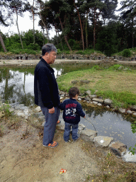 Max and Miaomiao`s father at the African Penguin enclosure at the Safaripark Beekse Bergen