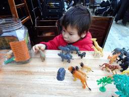 Max playing with animal toys at the Kongo restaurant at the Safaripark Beekse Bergen