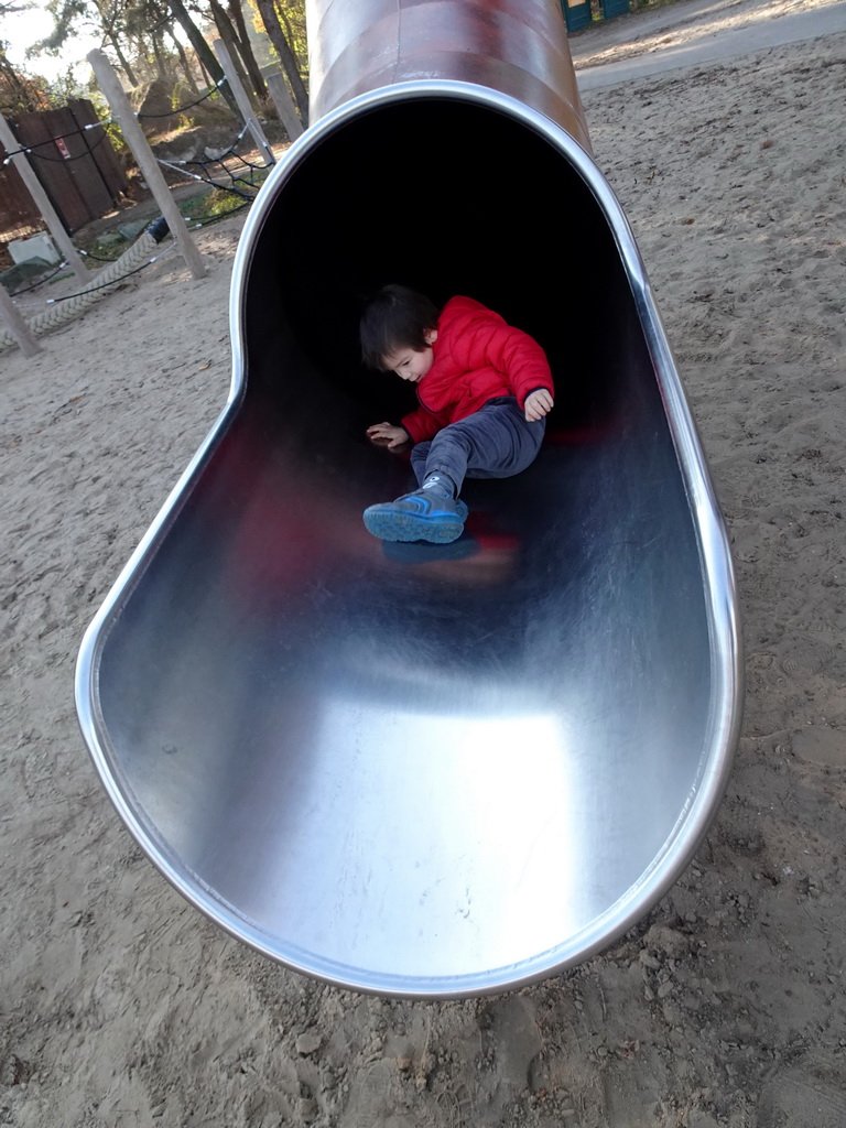 Max on the slide at the playground near the Kongo restaurant at the Safaripark Beekse Bergen