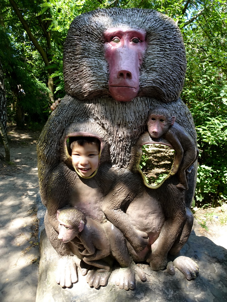 Max with a Baboon statue at the Safaripark Beekse Bergen