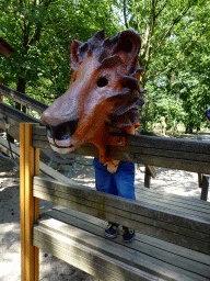 Max with a Lion mask at the playground near the Ranger Camp at the Safaripark Beekse Bergen