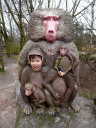 Max with a Baboon statue at the Safaripark Beekse Bergen