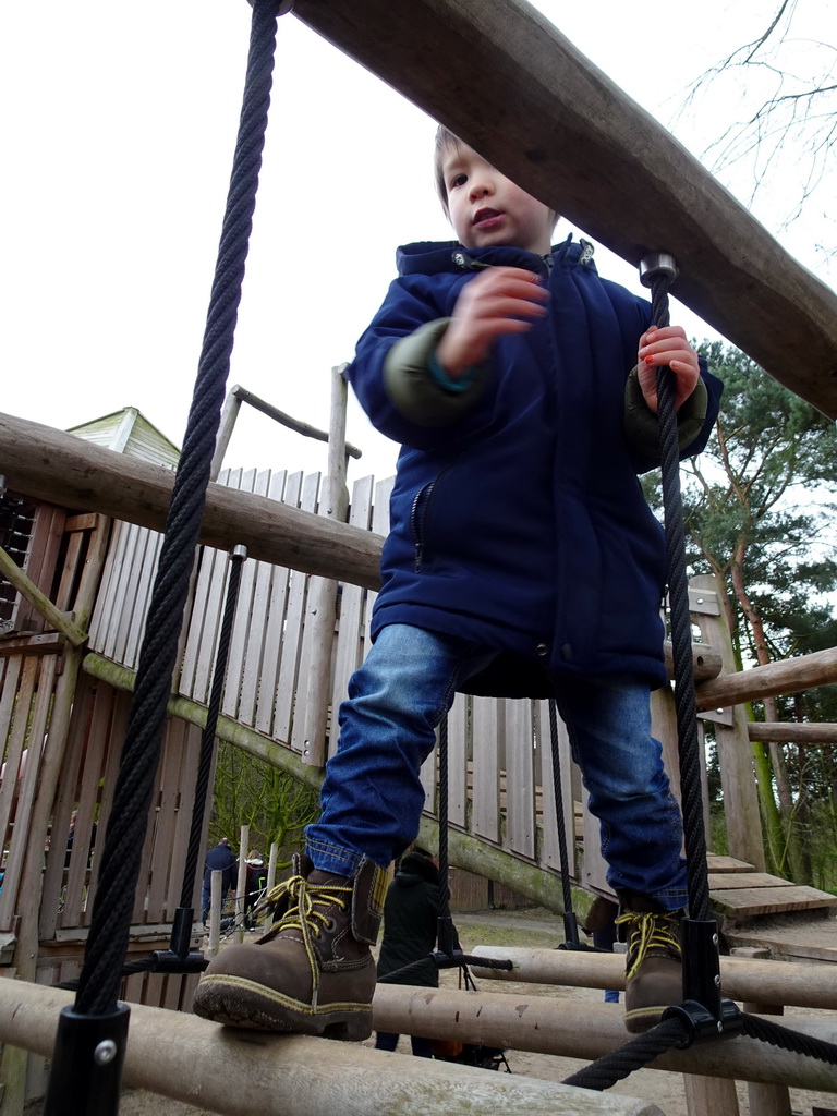 Max at the playground at the Kongoplein square at the Safaripark Beekse Bergen