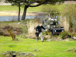 Zookeeper and jeep at the Birds of Prey Safari area at the Safaripark Beekse Bergen