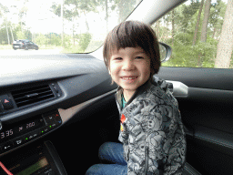 Max in the front of the car during the Autosafari at the Safaripark Beekse Bergen