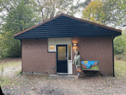 Miaomiao in front of our holiday home at the Landal Miggelenberg holiday park