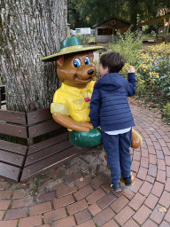 Max with a statue of the mascot Bollo at the Landal Miggelenberg holiday park