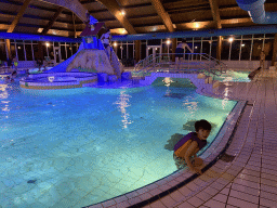 Max at the swimming pool at the Landal Miggelenberg holiday park, by night