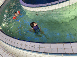 Max at the swimming pool at the Landal Miggelenberg holiday park