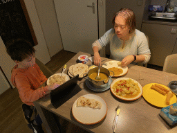 Miaomiao and Max having dinner in the kitchen of our holiday home at the Landal Miggelenberg holiday park