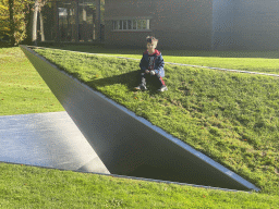 Max in the garden at the front of the Kröller-Müller Museum at the Wildbaanweg road