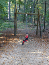 Max on a zip line at the playground next to the Park Pavilion