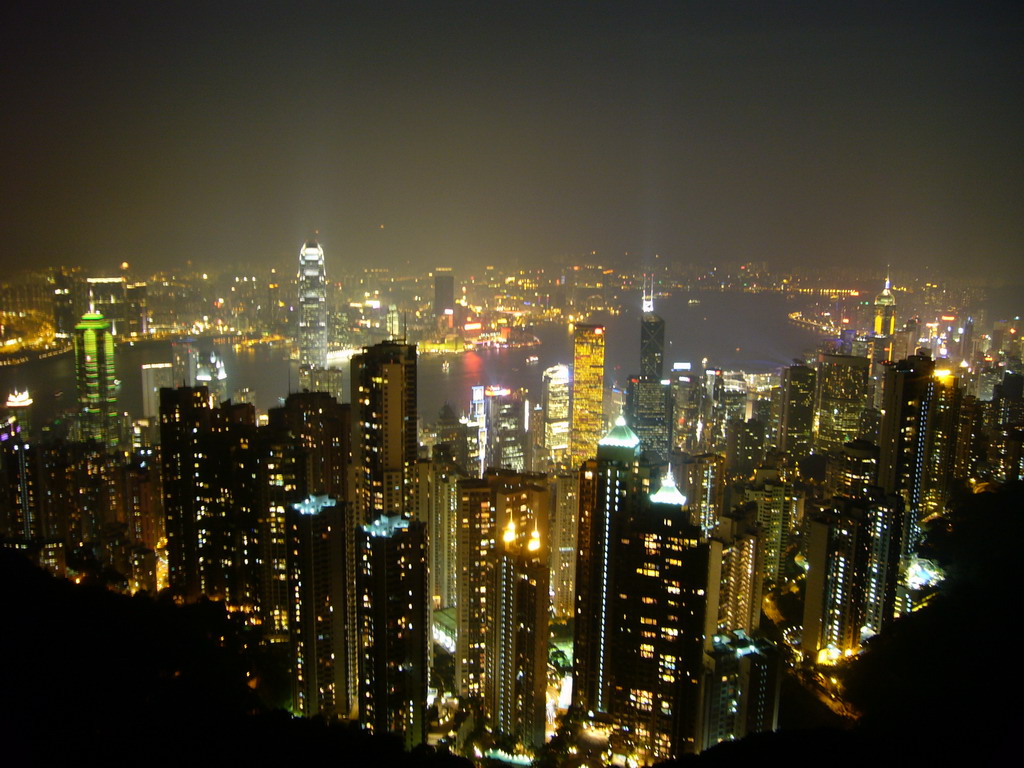 The Bank of China Tower, the Cheung Kong Centre, Two International Finance Centre, The Centre, other skyscrapers in the city center and Victoria Harbour, viewed from Victoria Peak, by night