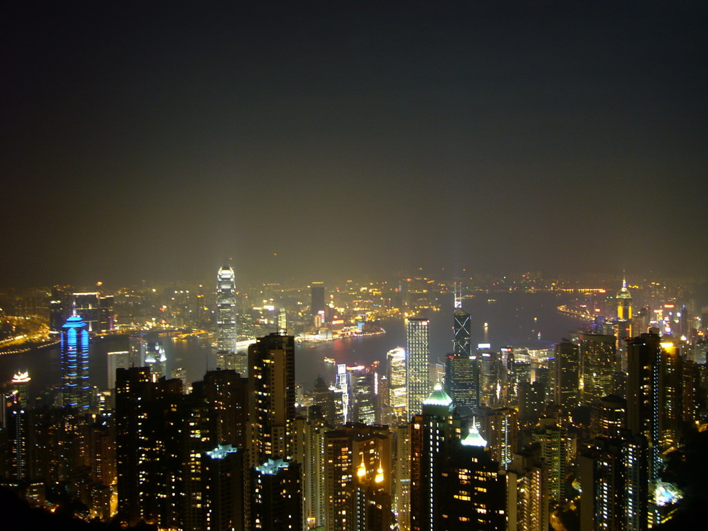 The Bank of China Tower, the Cheung Kong Centre, Two International Finance Centre, The Centre, other skyscrapers in the city center and Victoria Harbour, viewed from Victoria Peak, by night