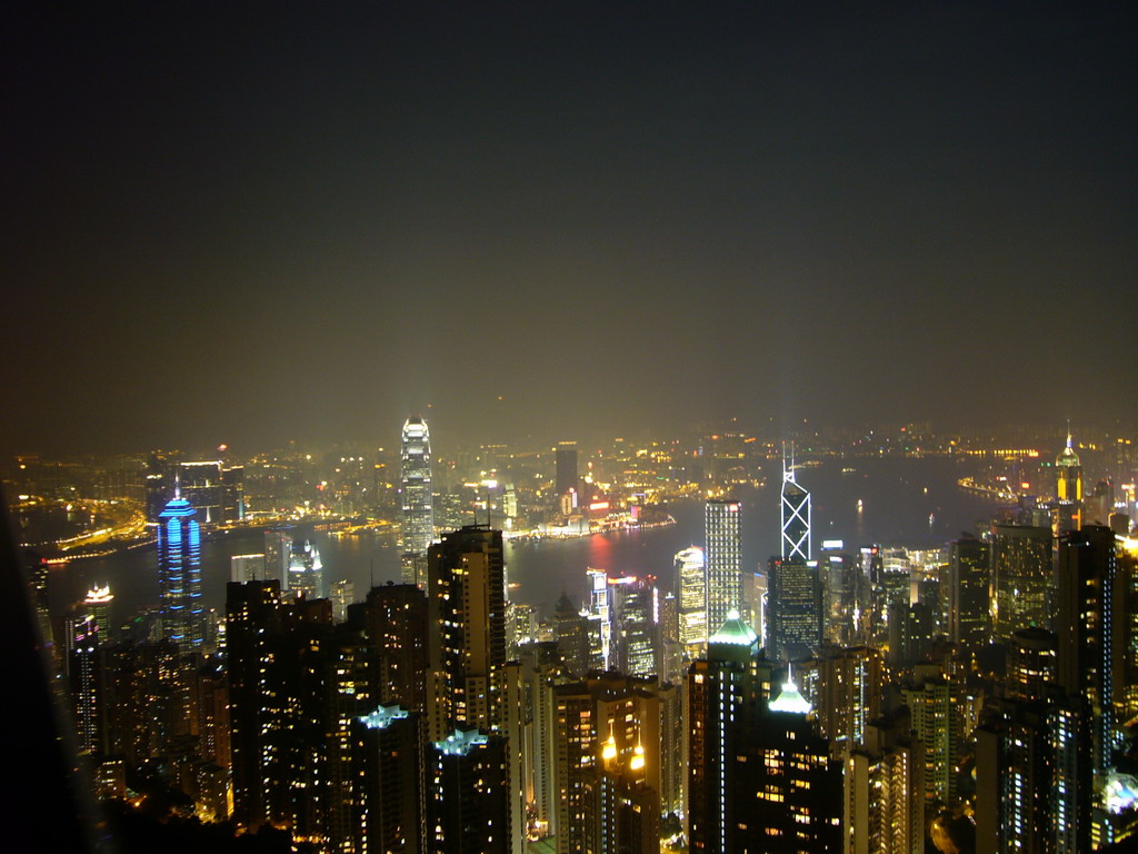 The Bank of China Tower, the Cheung Kong Centre, Two International Finance Centre, The Centre, other skyscrapers in the city center and Victoria Harbour, viewed from Victoria Peak, by night