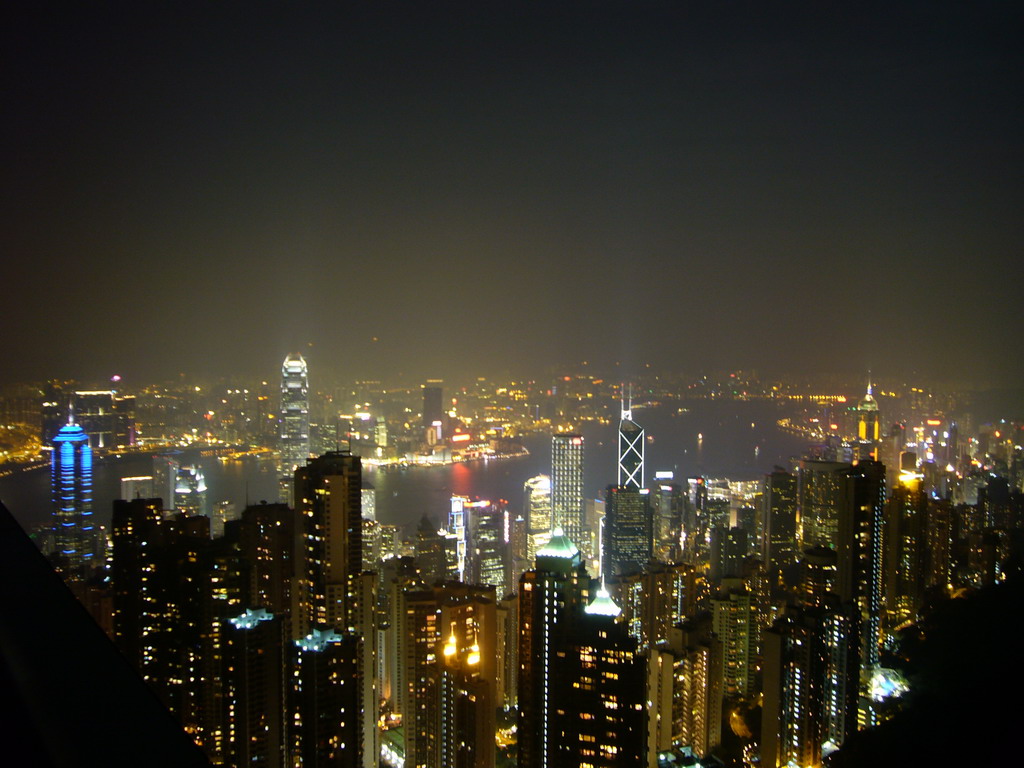 The Bank of China Tower, the Cheung Kong Centre, Two International Finance Centre, The Centre, other skyscrapers in the city center and Victoria Harbour, viewed from Victoria Peak, by night