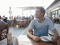 Tim on the terrace of a restaurant at the Avenue of Stars