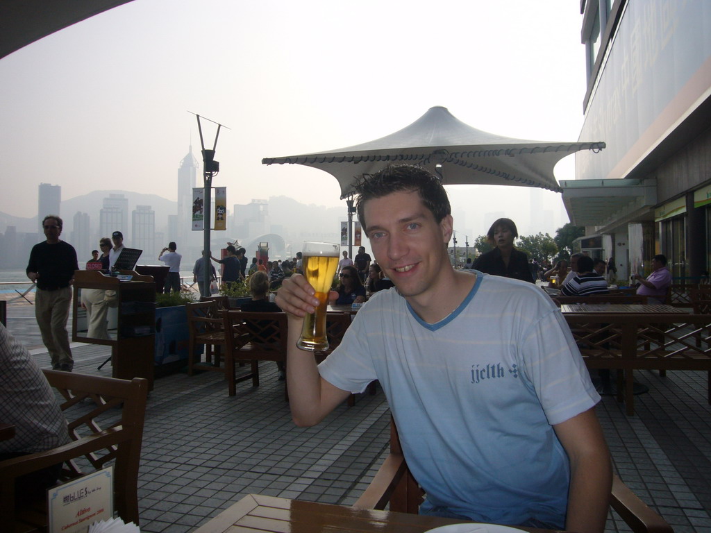 Tim with a beer on the terrace of a restaurant at the Avenue of Stars