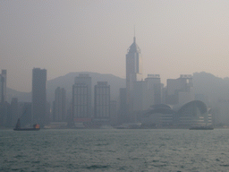 Boats in Victoria Harbour and the skyline of Hong Kong with the Central Plaza building and the Hong Kong Convention and Exhibition Centre, viewed from the Avenue of Stars