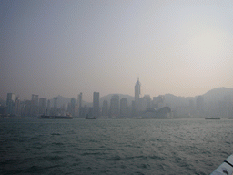 Boats in Victoria Harbour and the skyline of Hong Kong with the Central Plaza building and the Hong Kong Convention and Exhibition Centre, viewed from the Avenue of Stars