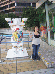 Miaomiao with a bear statue at the Avenue of Stars