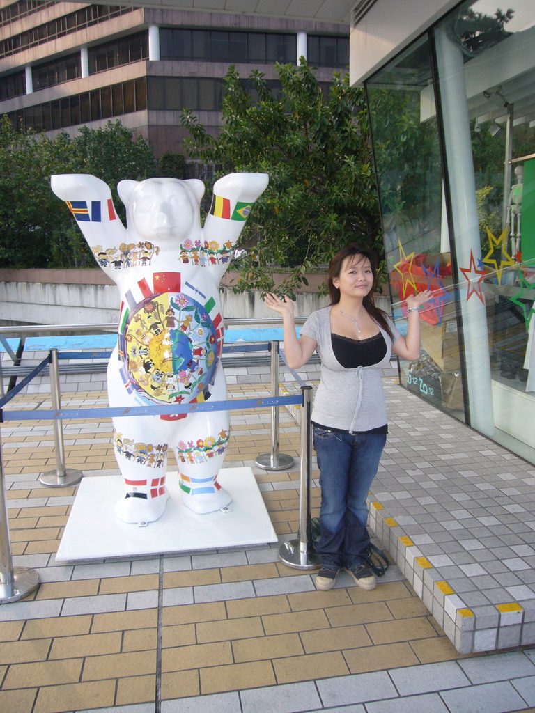 Miaomiao with a bear statue at the Avenue of Stars