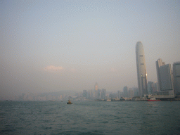 Boats in Victoria Harbour and the skyline of Hong Kong with the Two International Finance Centre, viewed from the Star Ferry from Kowloon to Hong Kong Island